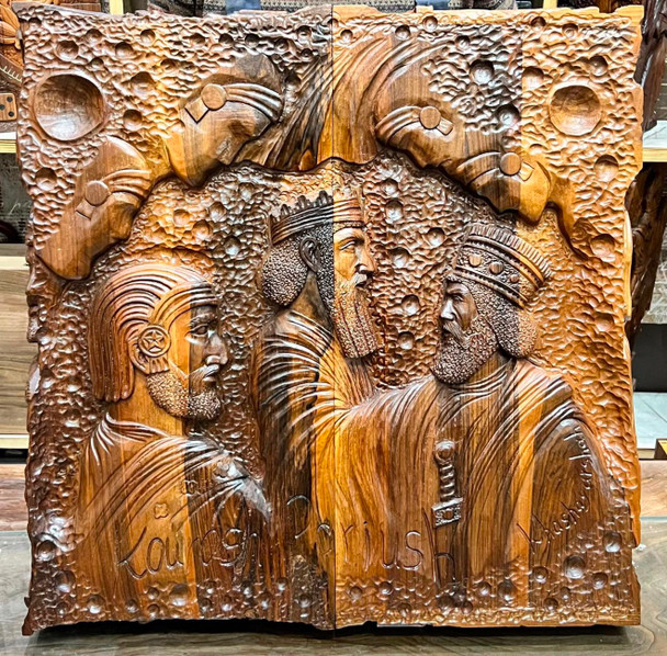 Detailed view of the opened interior board, emphasizing the mesmerizing radiant swirls of the exotic burl wood veneer and the precise alignment of the polished brass hinge pins.