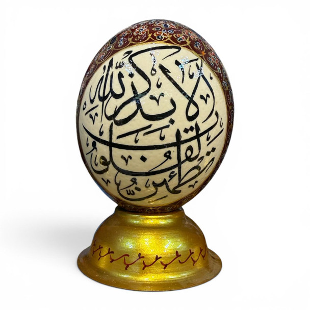 Ornate hand-painted ostrich egg, a unique and sophisticated addition to any home decor collection.
