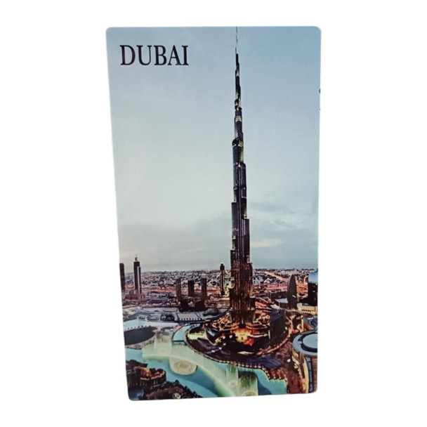Close-up of the durable aluminum fridge magnet depicting the stunning Burj Khalifa and Dubai Fountain skyline.