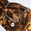 Sterling Silver Celtic Trinity Knot Bracelet with Amethyst Cubic Zirconia Charms