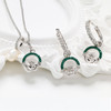 Sterling Silver Claddagh Earrings with Green Crystals