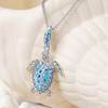 Sterling Silver Turtle Necklace with Aquamarine and White Crystals