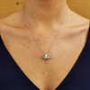 Silver Stingray Abalone Pendant Adorned With White Crystal