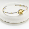 Sterling Silver Claddagh Bangle with Gold-Plated Medallion