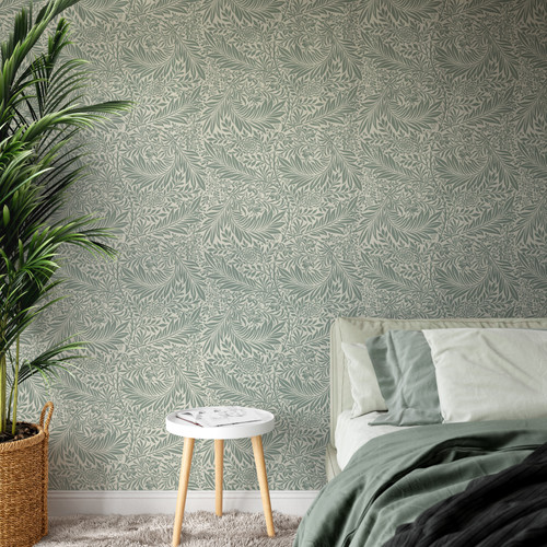 This beautifully illustrated William Morris inspired wallpaper features intertwining larkspur foliage in a sage green tone. A brilliantly subtle feature wallpaper.