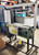 2 CARTON STRAPPING MACHINES, SIGNODE MCD 700, 3/8" plastic, For Repair or Parts