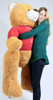 Big Plush Giant Valentine Teddy Bear Five Feet Tall Honey Brown Color Wears Tshirt that says HAPPY VALENTINES DAY