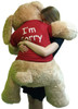 Say I'm Sorry With Giant Stuffed Puppy Dog 5 Foot Soft Tan Wears T shirt that says I'M SORRY