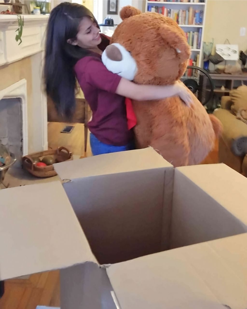 This is a customer photo showing how large the box is when she received her Big Plush teddy bear.