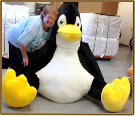 One of our latest custom made stuffed animal projects we designed from just a photo. Tux is 6-feet tall.