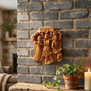 Dryad Design Brigid wall plaque on brick wall