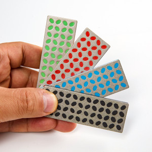 Handheld fan display of the XCMAN Ski Snowboard Diamond Files Plate 4-in-One Set featuring 240, 360, 500, and 1000 grit stones