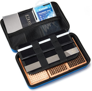 Open view of the XCMAN Ski and Snowboard Waxing and Tuning Kit showing organized tools neatly packed inside the travel storage bag