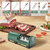 Kitchen lifestyle scene demonstrating the electric sharpener used alongside sliced meat, vegetables, and various knife types