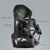 Rear-angle view of the XCMAN Ligero adjustable snowboard binding showcasing the Ergo-X highback, forward lean adjustment mechanism, ultralight ankle strap, and FT4 baseplate