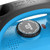 Close-up of the precision thermostat temperature control dial and indicator light on top of the XCMAN iron