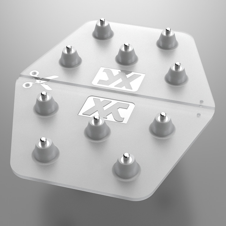 XCMAN Snowboard Spike Stomp Pad Anti-Slip in clear translucent color showing metal spikes and logo detail on a white background