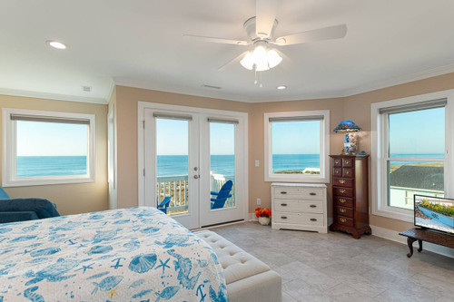 Master Bedroom with panoramic view of beach & ocean
