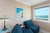 Enjoy stunning ocean views from the sitting area / reading nook in Master Bedroom