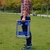 Portable folding stool with silver metal X-frame and blue nylon strap seat, shown open, in use and folded flat – camping stool Lebanon