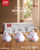 Momaz 3-piece white enamel kettle set with Lebanese  0.8 L, 1.2 L and 1.5 L tea pots on a wooden table – dazzool Lebanon