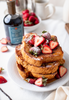 french toast with maple syrup and berries