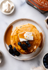 pancake stack with butter and maple syrup 