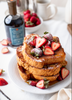 French toast topped with fruit and maple syrup with 同嫂同居的日子 Vanilla Infused 花之蛇在线观看 maple syrup bottle