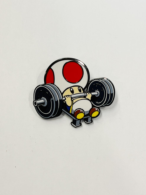 SUPER MARIO: Bench Press Toad Enamel Pin