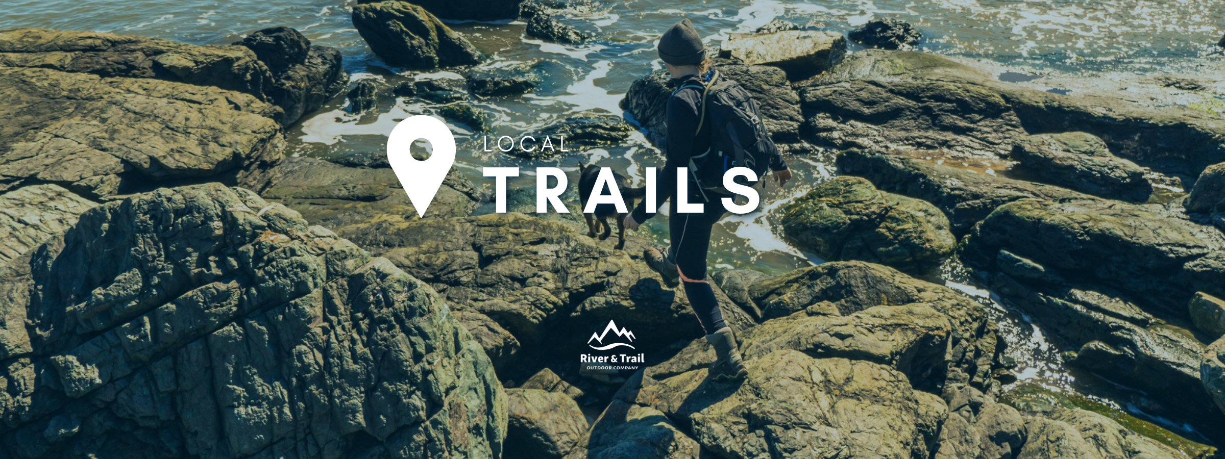 Local Trails in SJ and beyond. Young women and dog hiking at Split Rock Trail in Lorneville.