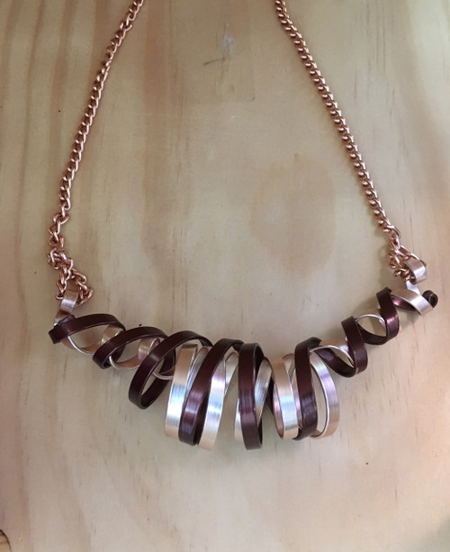 Brown and Rose Copper Color Anodized Aluminum twirled necklace
