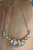 Gold and Silver Color Anodized Aluminum twirled necklace