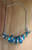 Blue and Silver Color Anodized Aluminum twirled necklace