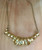 Gold Color Anodized Aluminum twirled necklace