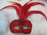 MASK RED WITH RED TRIM AND FEATHERS