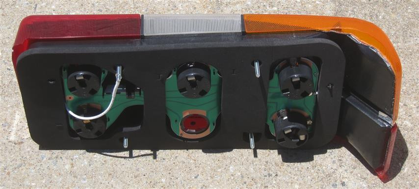 Volvo 240 Tail Light Assembly (Chrome Trim) for 19851993 Sedans