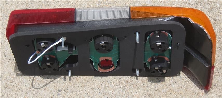 Volvo 240 Tail Light Assembly (Black Trim) for 19851993 Sedans