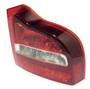 Pictured: Right (Passenger) side tail light assembly for a Volvo S80 (model year 2001, 2002, or 2003).