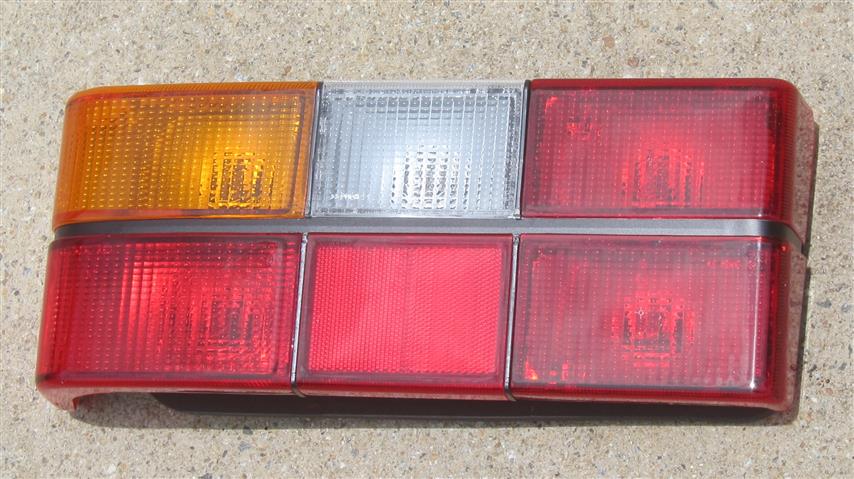 Volvo 240 Tail Light Assembly (Black Trim) for 1985-1993 Sedans