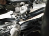 Close-up of JBtuned RSX DC5 clutch line connected to the transmission slave cylinder with stainless-steel adapter hardware.