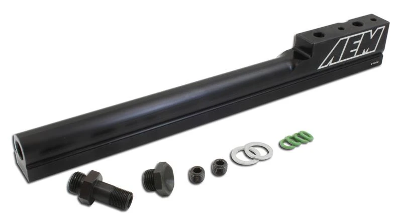 AEM 25-100BK B18/B20 B-Series high-volume fuel rail with supplied installation hardware, fittings, injector O-rings, and 1/8 NPT port plug.