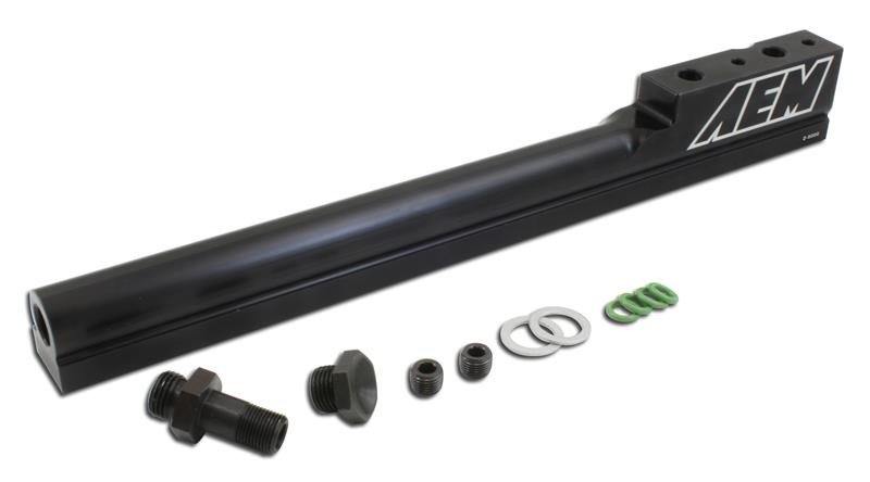 AEM 25-103BK B16 B-Series high-volume fuel rail with supplied installation hardware, fittings, injector O-rings, and 1/8 NPT port plug.