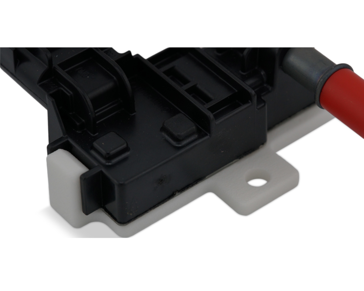 Close-up of JBtuned flex fuel sensor mounting bracket showing how the bracket clips around the Continental 13577429 sensor body.