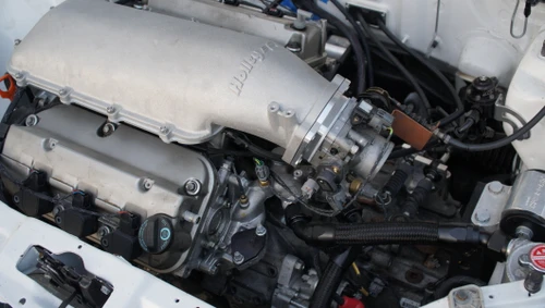 Inatake manifold will cover the lines and give it a tuckd look