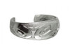 Wide silver bracelet, etched with a West Coast First Nations abstract design.