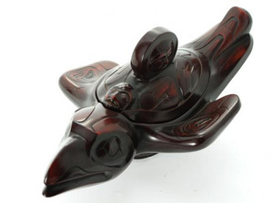 Rosewood spirit box carved in West Coast First Nations raven design. Rosewood spirit box carved in West Coast First Nations raven design.