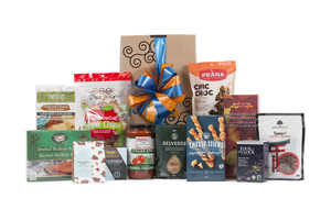 Gourmet gift basket featuring nutritious snacks (chocolate, tea, nuts, etc.) packaged in signature Green & Green gift box with ribbon and bow.