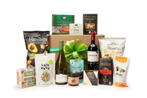 Gourmet red and white wine gift box featuring Cloudy Bay Sauvignon Blanc & Tenuta Sette Ponti Crognolo paired with sweet and savoury snacks (chocolate, crackers, nuts, etc.), packaged in signature Green & Green gift box with ribbon and bow. Gourmet red and white wine gift box featuring Cloudy Bay Sauvignon Blanc & Tenuta Sette Ponti Crognolo paired with sweet and savoury snacks (chocolate, crackers, nuts, etc.), packaged in signature Green & Green gift box with ribbon and bow.