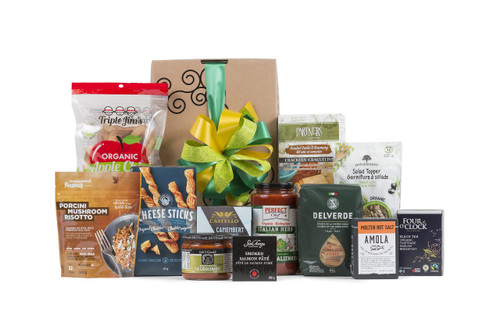 Selection of pantry staples from meals to snacks, sweet and savory items wrapped in Green & Green signature gift box.