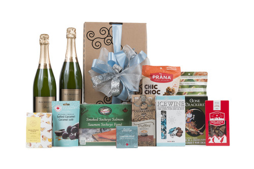 Gourmet gift basket featuring two bottles of Blue Mountain Gold Label Brut Sparkling Wine, and sweet and savoury snacks (chocolate, crackers, nuts, etc.), packaged in signature Green & Green gift box with ribbon and bow. Gourmet gift basket featuring two bottles of Blue Mountain Gold Label Brut Sparkling Wine, and sweet and savoury snacks (chocolate, crackers, nuts, etc.), packaged in signature Green & Green gift box with ribbon and bow.